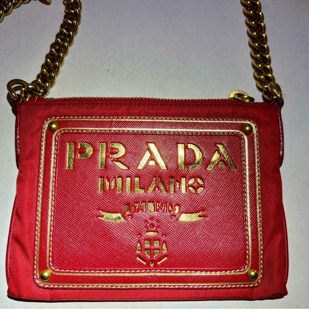 PRADA
Red Tessuto Oro Chain Crossbody Bag